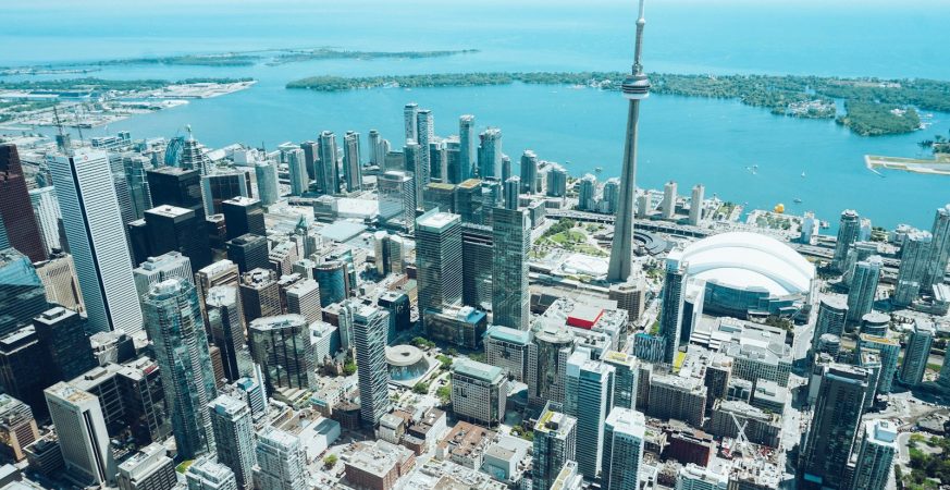 Aerial view of downtown Toronto's financial district and the CN Tower by the waterfront