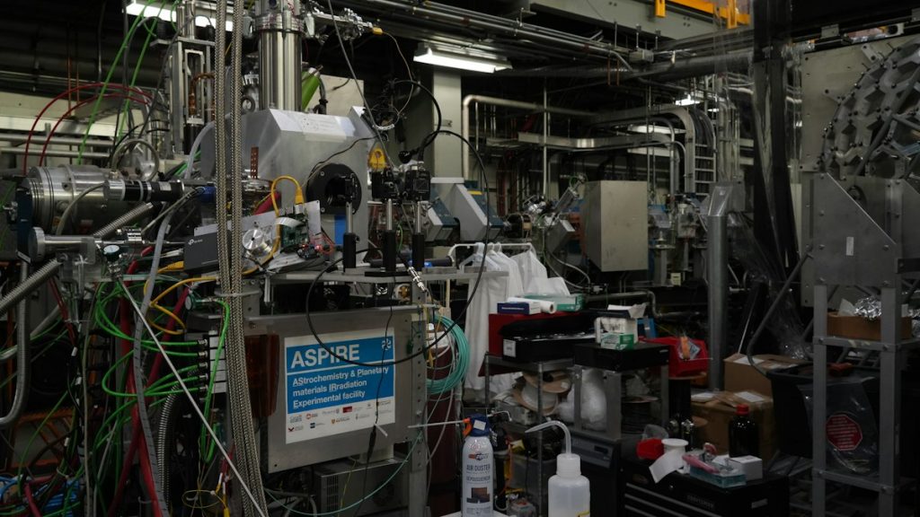 Laboratory with pipes, cables and scientific instruments in an advanced physics facility in Vancouver
