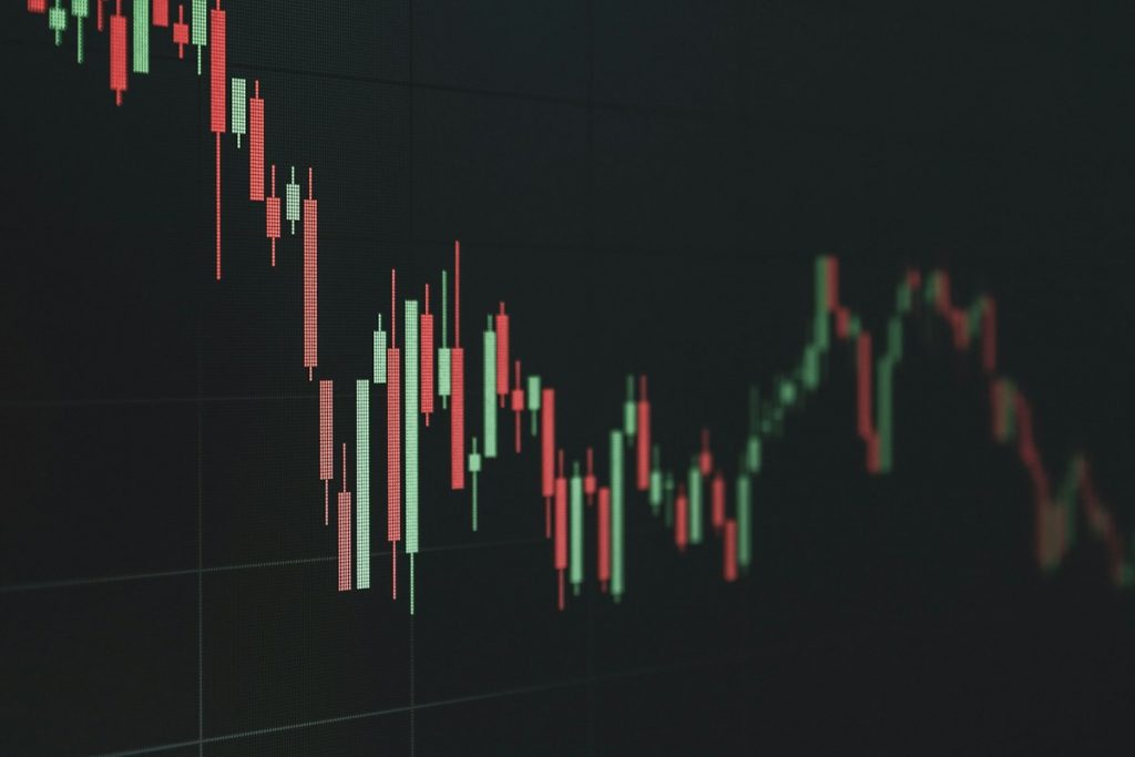 Phone screen showing a financial chart with a declining trend
